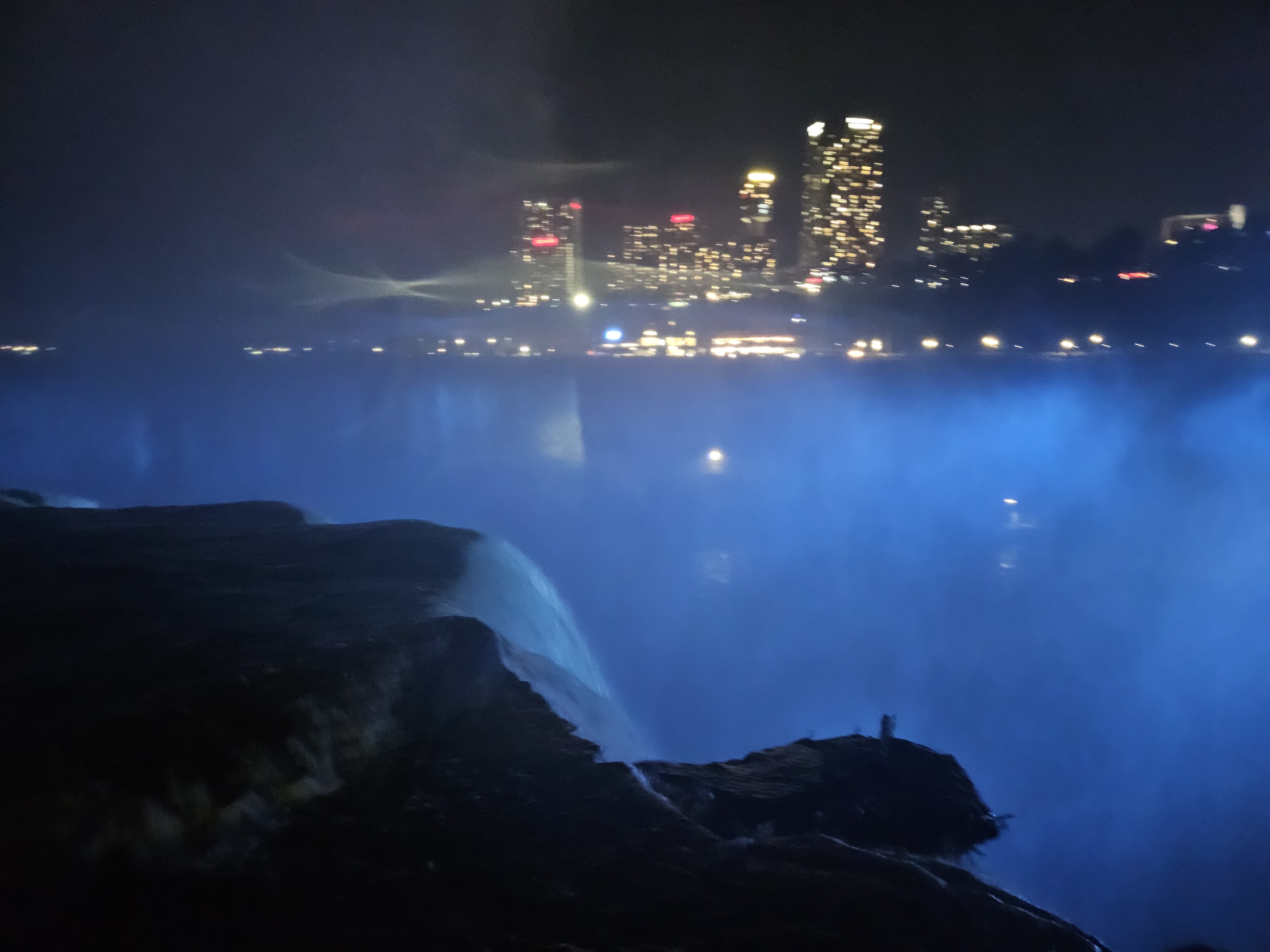 Niagara Falls illuminated at night during a 2025 visit